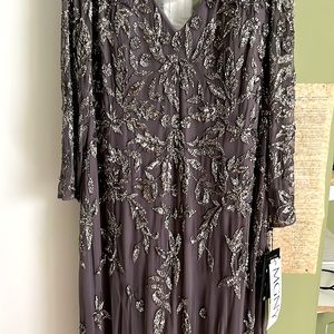 MGNY long dress. New. Never worn or altered. Gray/w silver beads. Size 16
